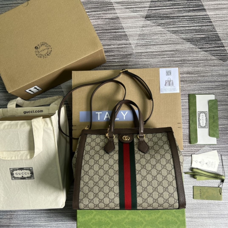 G*u*i top handle bags